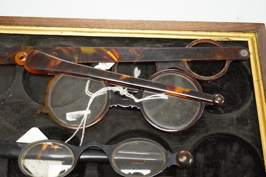 A pair of 18th-century tortoiseshell framed temple spectacles, the silver hinges with maker’s mark ‘CR,’ (one arm shortened) various tortoiseshell and simulated tortoiseshell lorgnettes, a monocle and a pair of scissor s